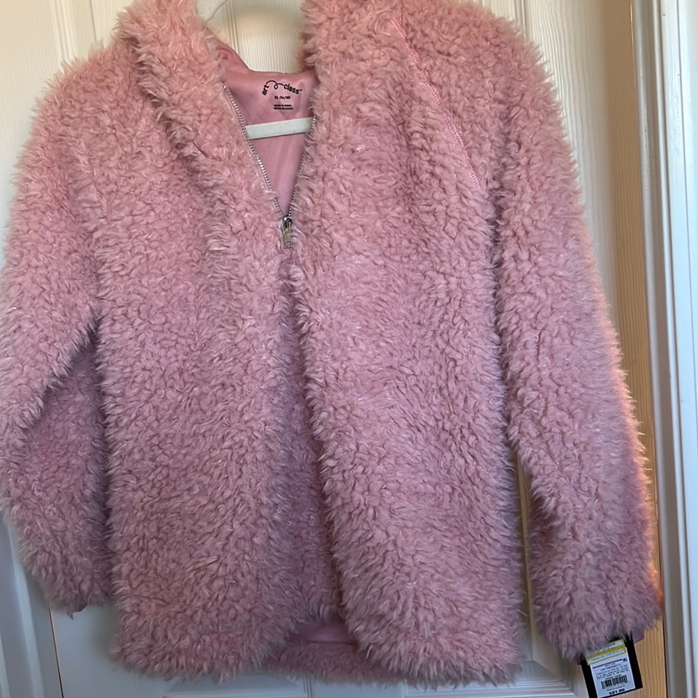 I’m selling a super soft, dusty rose colored hoodie.